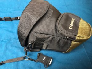 camera strap with holster to make Handling Cameras and Gear Easily